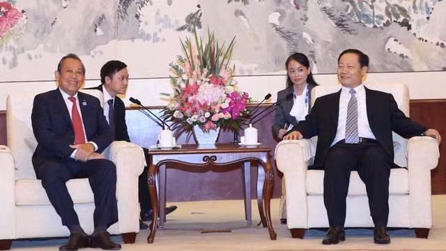 越南政府副总理张和平会见中国广西壮族自治区党委书记彭清华。（图片来源：VGP）